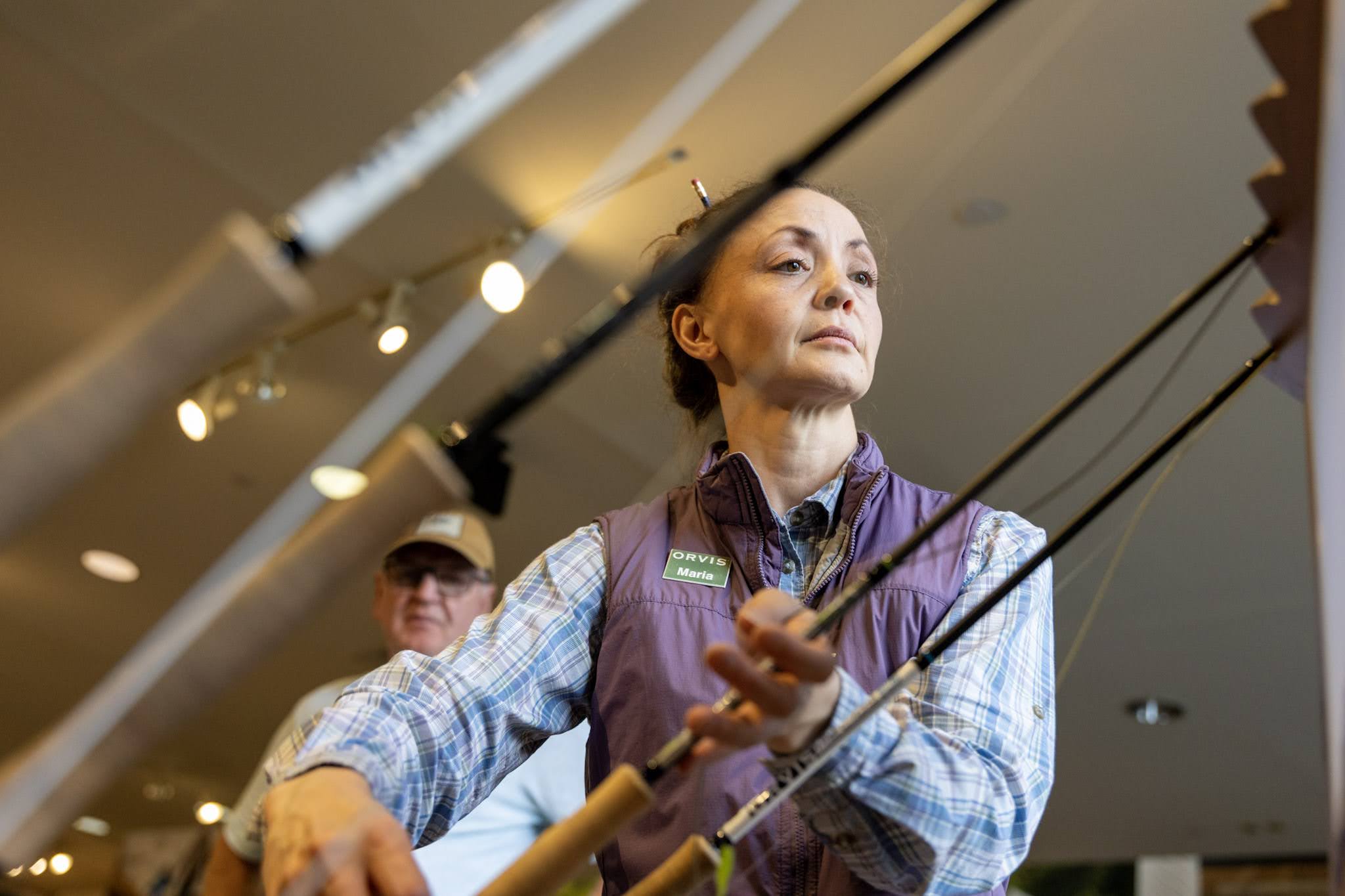 Orvis employee working on products